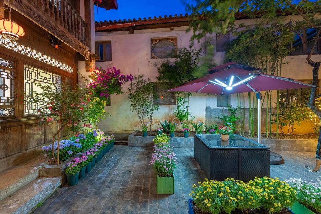 Fotografie z fotogalerie ubytování Lijiang Gui Yuan Tian Ju Guesthouse v destinaci Li-ťiang