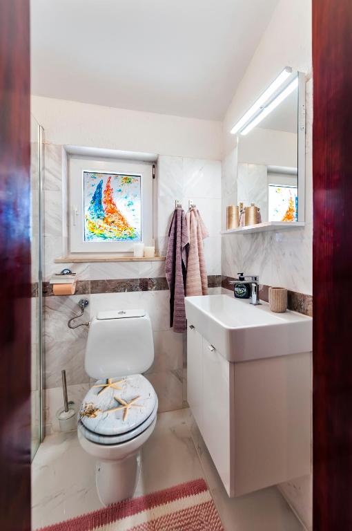 Koupelna v ubytování Guesthouse Ava