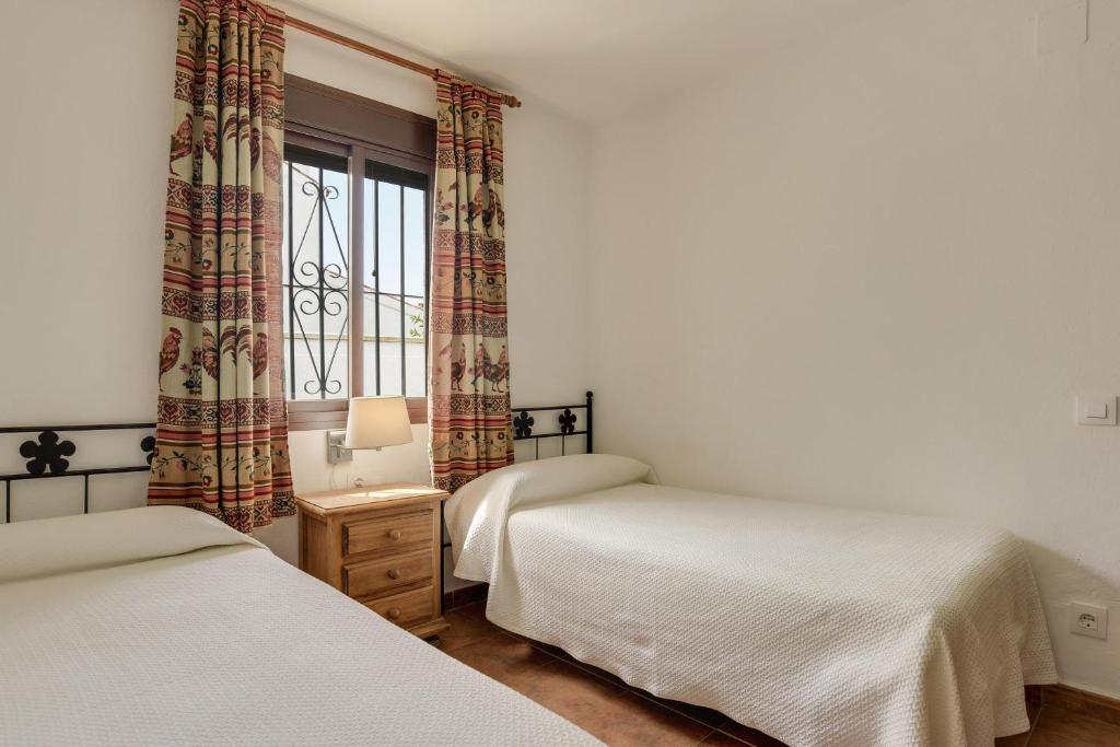 Postel nebo postele na pokoji v ubytování Casa Miguelin
