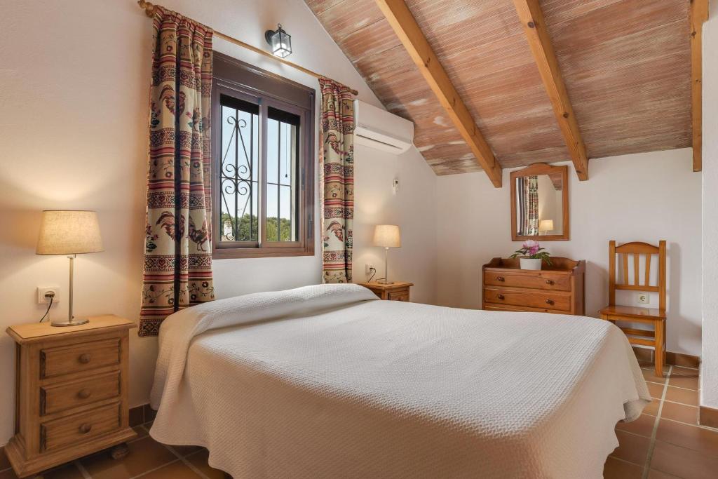 Postel nebo postele na pokoji v ubytování Casa Miguelin