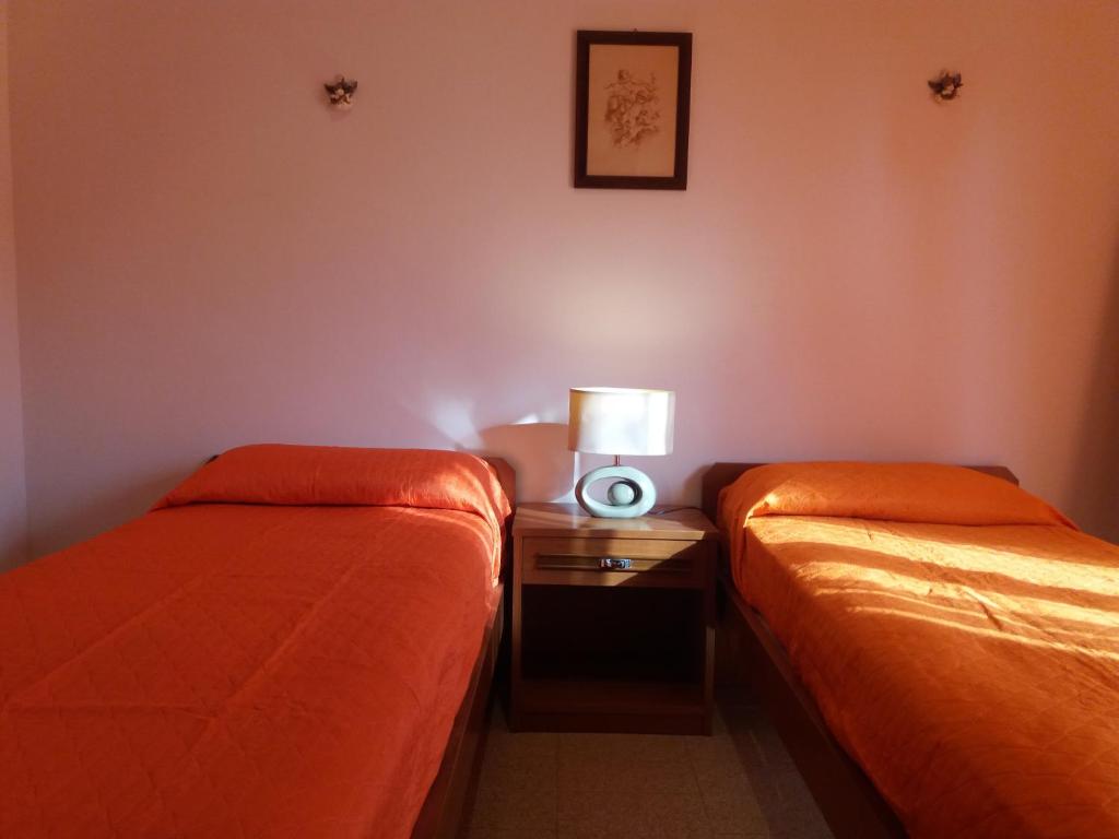 Postel nebo postele na pokoji v ubytování Casa Fronte Gole Alcantara