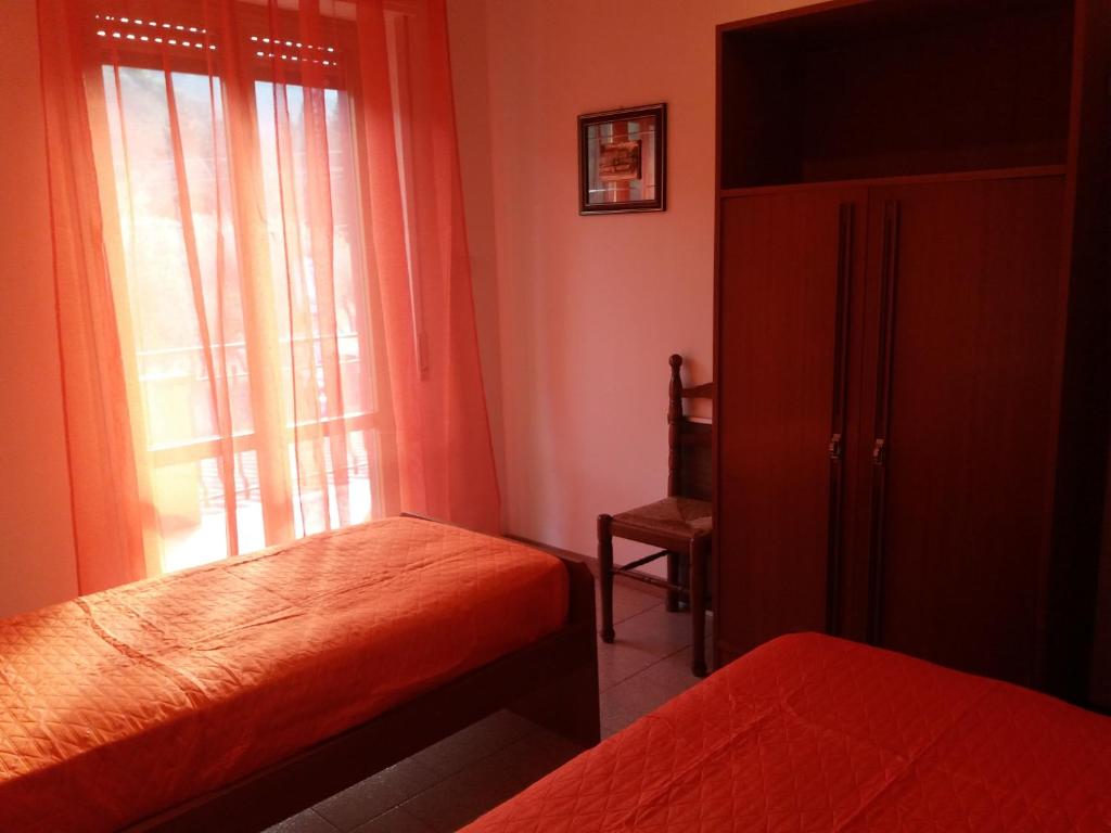 Postel nebo postele na pokoji v ubytování Casa Fronte Gole Alcantara