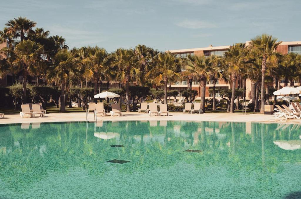 The swimming pool at or close to Casa Praia dos Salgados