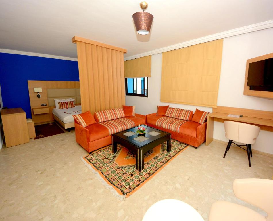 Posezení v ubytování Oasis Hotel & Spa