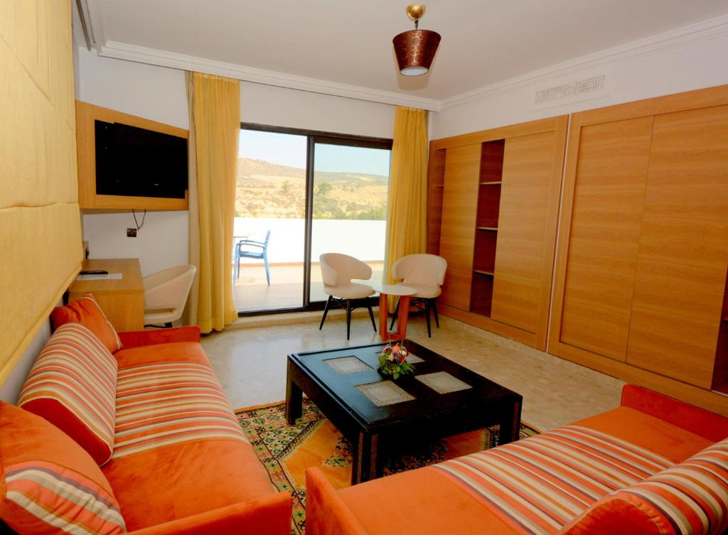 Posezení v ubytování Oasis Hotel & Spa