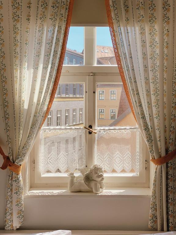 Postel nebo postele na pokoji v ubytování Appartementhaus am Schloss