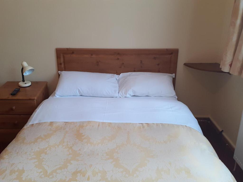 Postel nebo postele na pokoji v ubytování Redclyffe Guesthouse