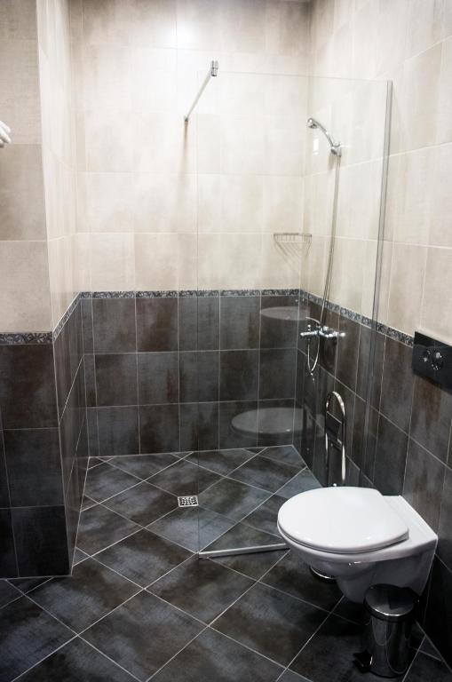 Koupelna v ubytování Stenso Rooms