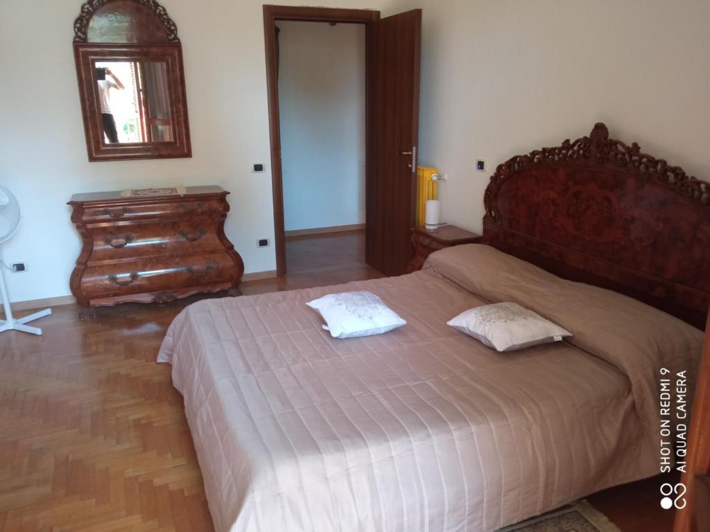 Postel nebo postele na pokoji v ubytování San Casciano