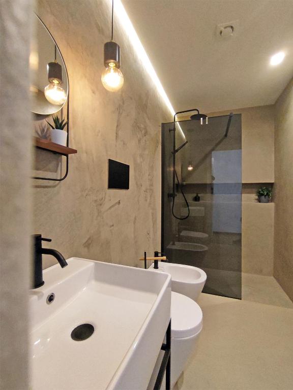 Kúpeľňa v ubytovaní Bassi77 - rooms & apartments