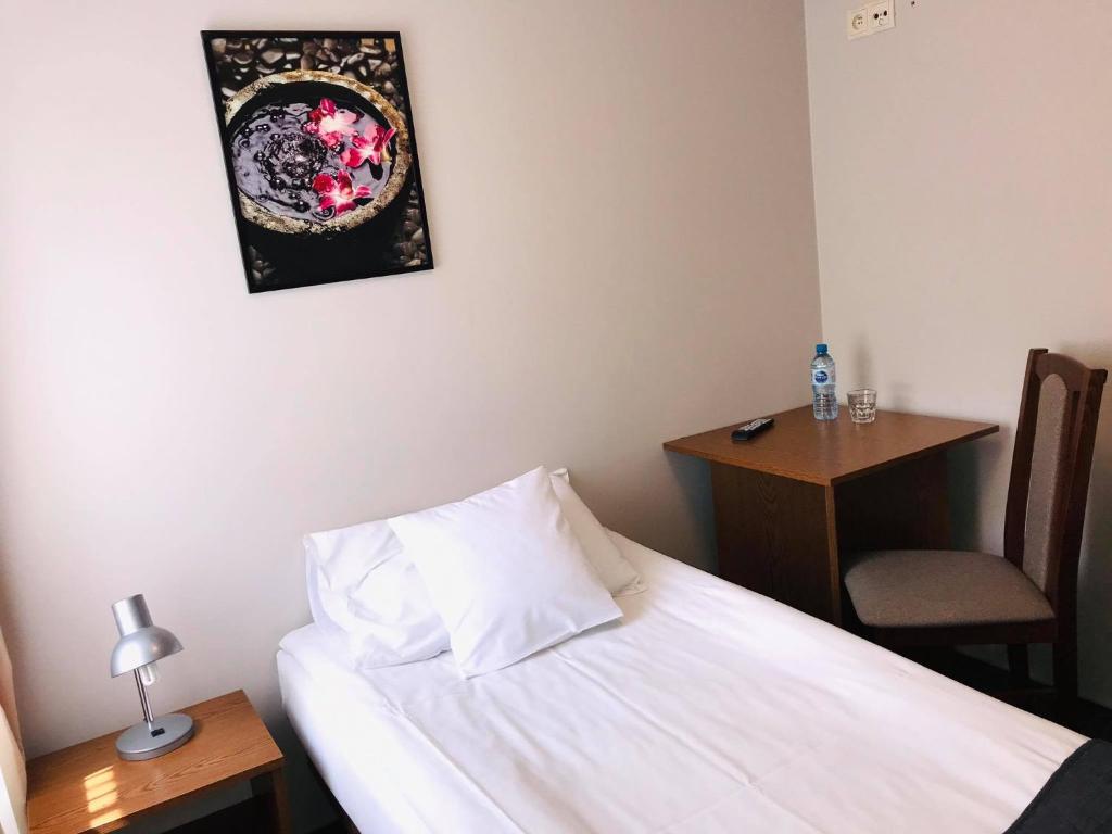 Postel nebo postele na pokoji v ubytování Astral