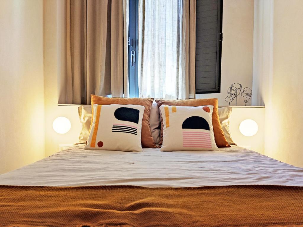 Posteľ alebo postele v izbe v ubytovaní Bassi77 - rooms & apartments