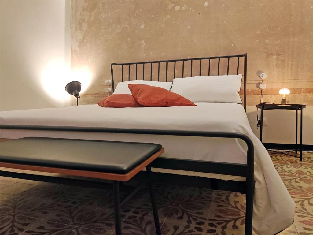 Posteľ alebo postele v izbe v ubytovaní Bassi77 - rooms & apartments