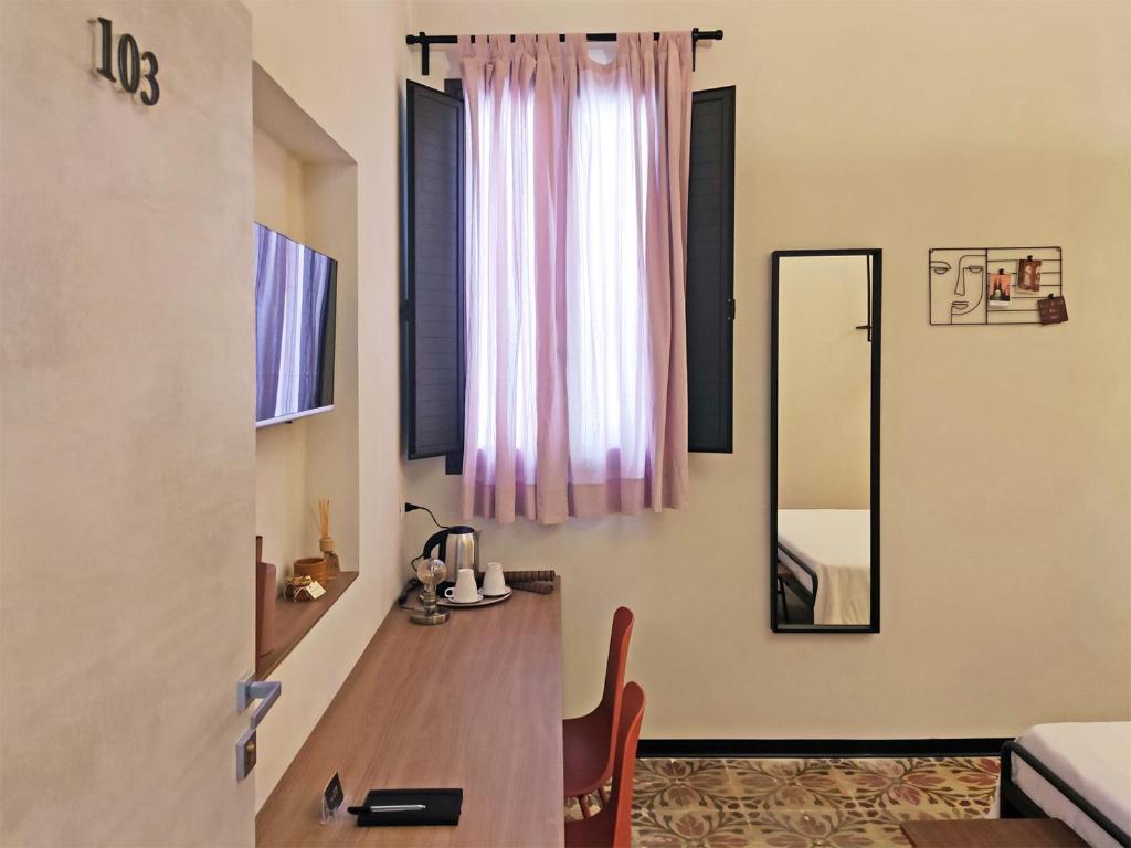 Posteľ alebo postele v izbe v ubytovaní Bassi77 - rooms & apartments