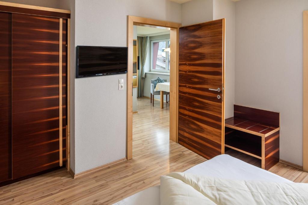 TV a/nebo společenská místnost v ubytování Apparthaus & Chalets Hofer