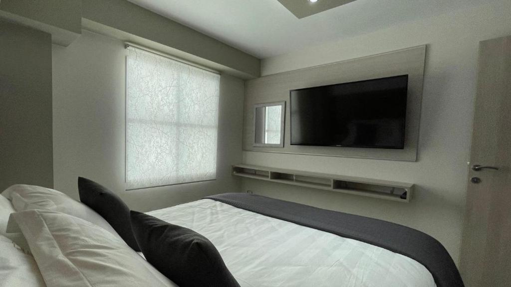 Postel nebo postele na pokoji v ubytování luxrooms