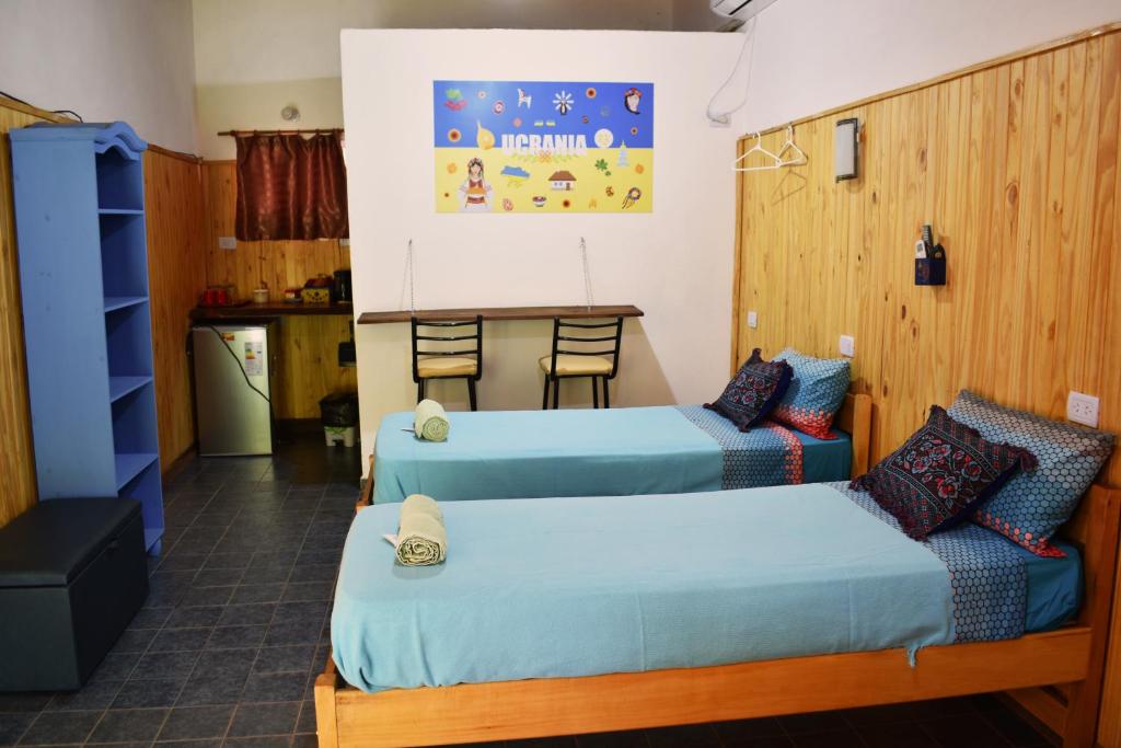 Letto o letti in una camera di Cabañas Oberá