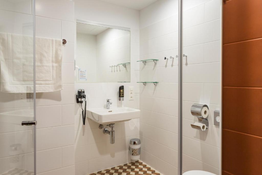 Bagno di MEININGER Hotel Zürich Greencity