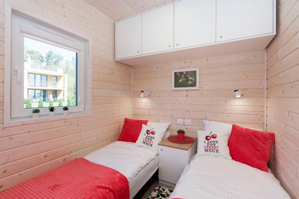 Posteľ alebo postele v izbe v ubytovaní Cherry House Gdańsk