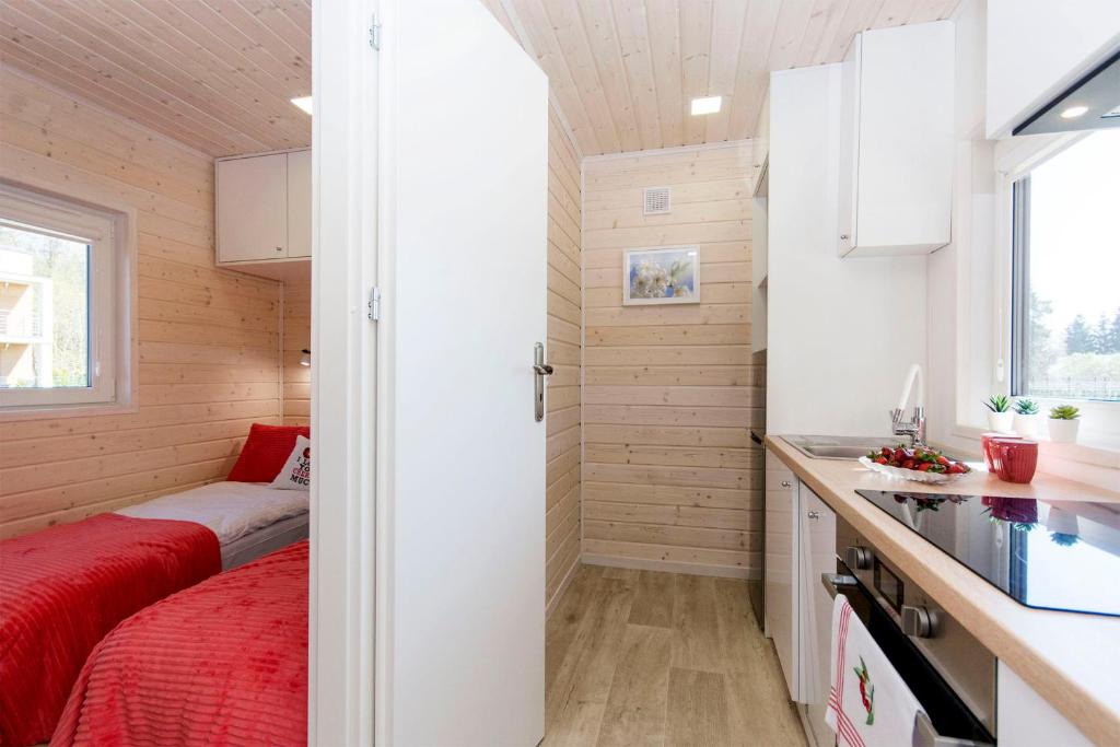 Kuchyňa alebo kuchynka v ubytovaní Cherry House Gdańsk