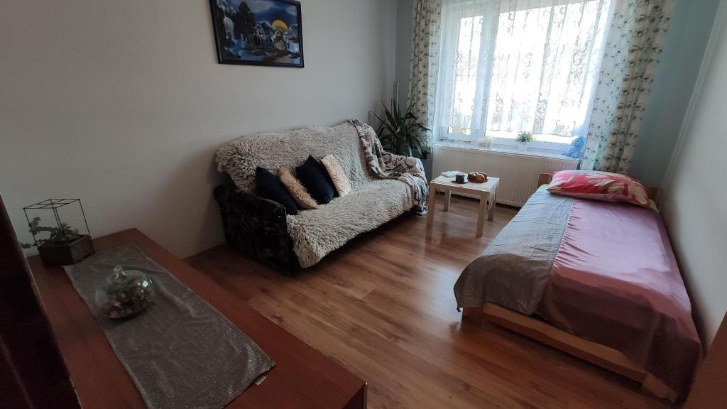Posteľ alebo postele v izbe v ubytovaní Apartament Pilsko 1