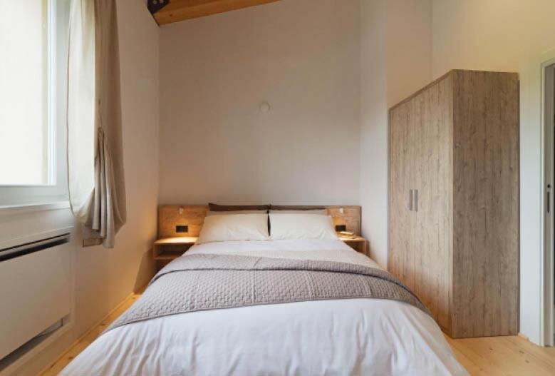 Postel nebo postele na pokoji v ubytování Tenuta Grimaldi Wine Resort