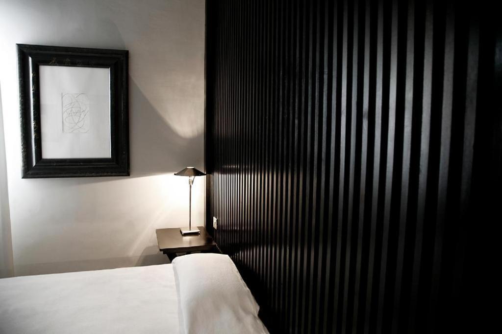 A bed or beds in a room at Hotel Market