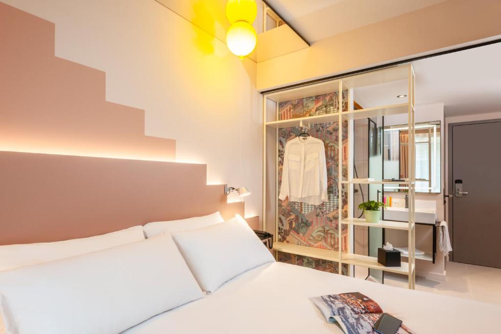 Posteľ alebo postele v izbe v ubytovaní ibis Styles Zurich City Center