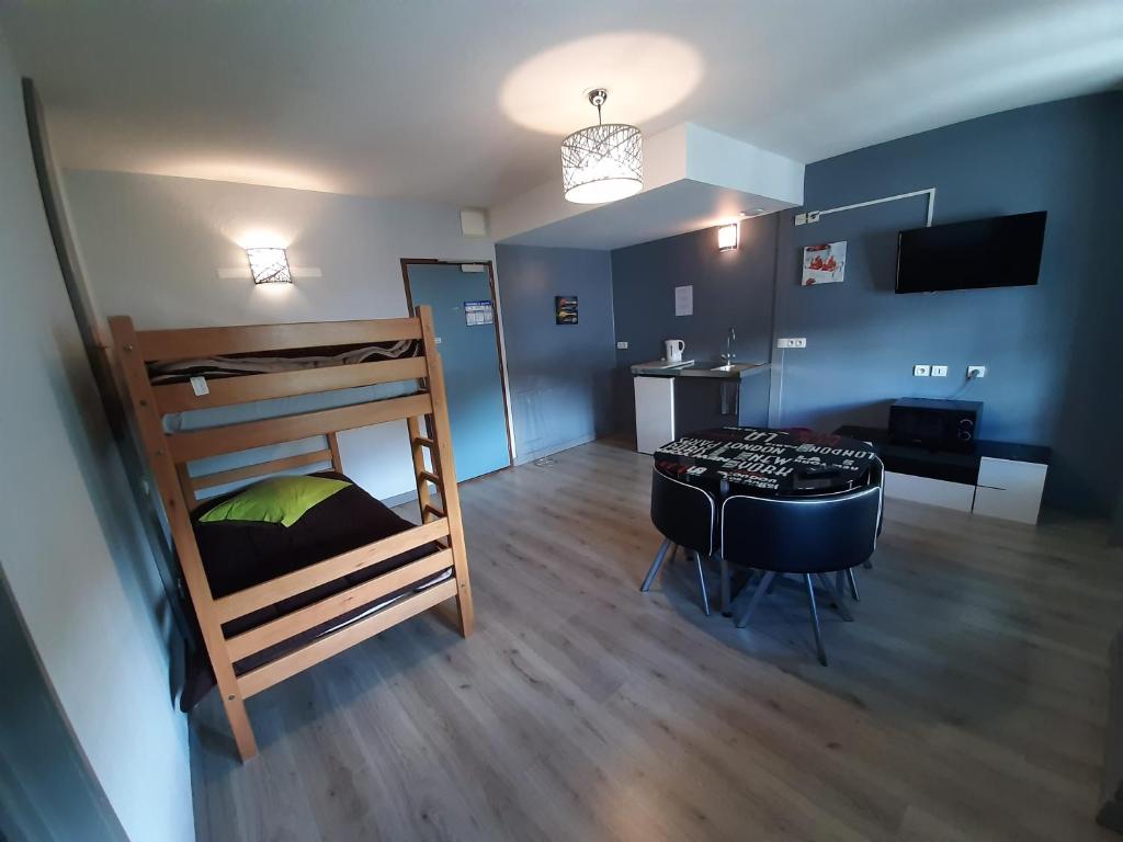 Postel nebo postele na pokoji v ubytování Hôtel de La Vallée