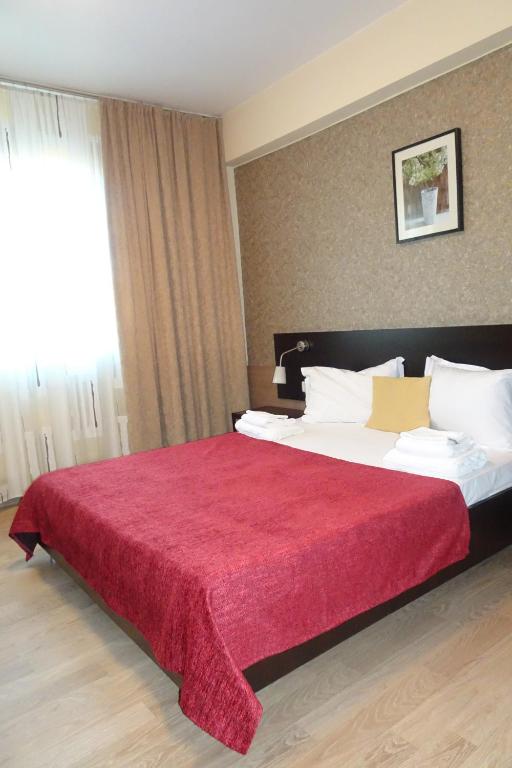 Postel nebo postele na pokoji v ubytování Hotel Nord