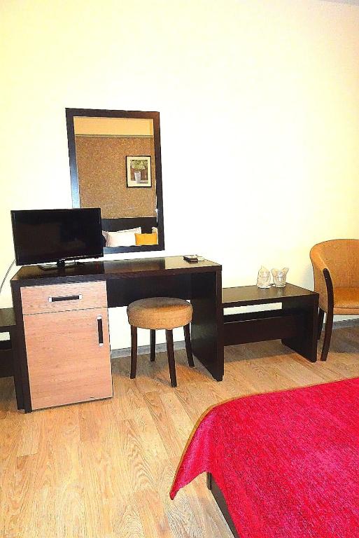 TV a/nebo společenská místnost v ubytování Hotel Nord