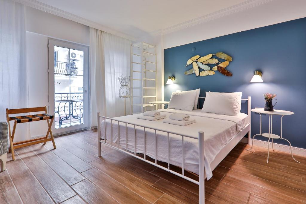 Postel nebo postele na pokoji v ubytování Yaz Apart Hotel