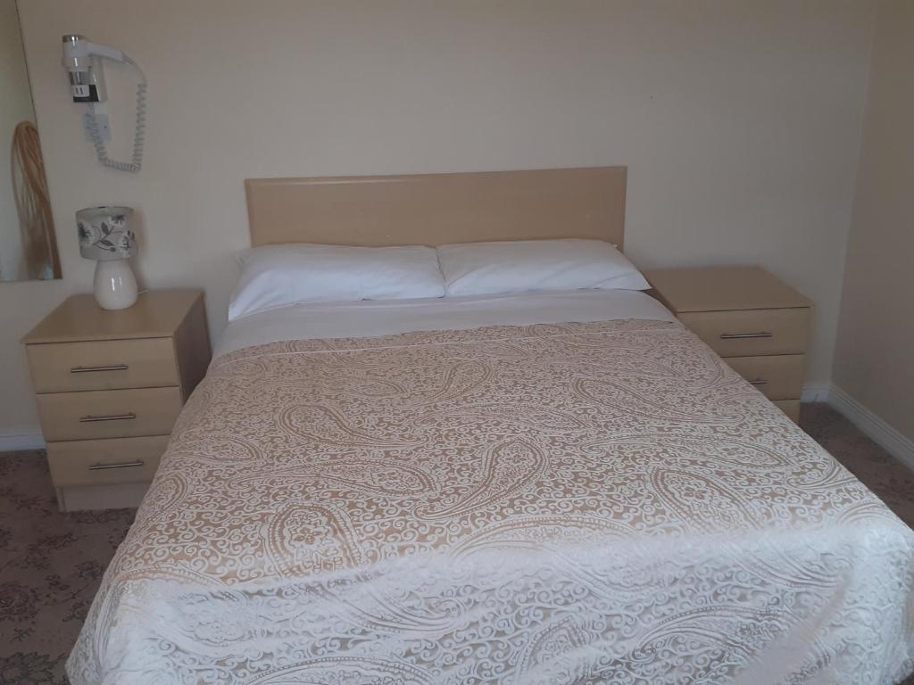 Postel nebo postele na pokoji v ubytování Redclyffe Guesthouse