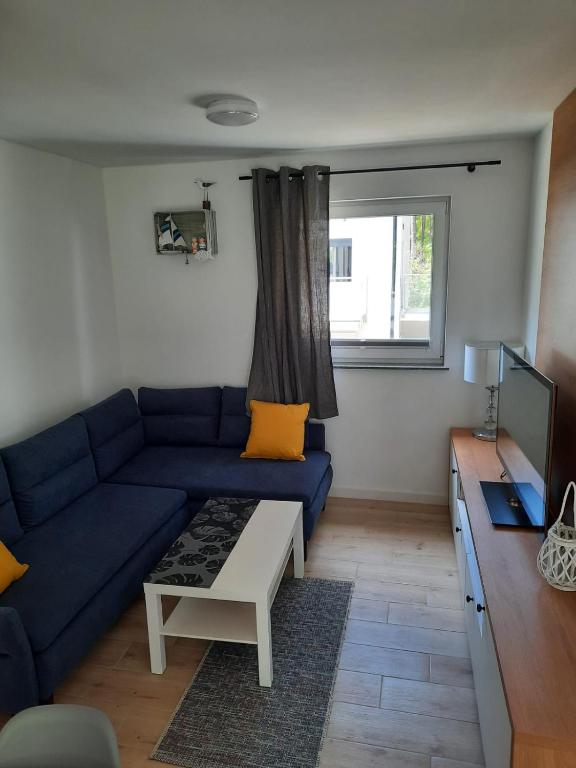 Część wypoczynkowa w obiekcie Komfortowy apartament dwupoziomowy w cichej okolicy