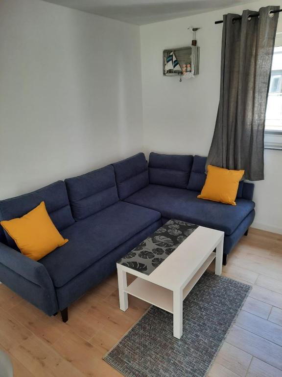 Część wypoczynkowa w obiekcie Komfortowy apartament dwupoziomowy w cichej okolicy