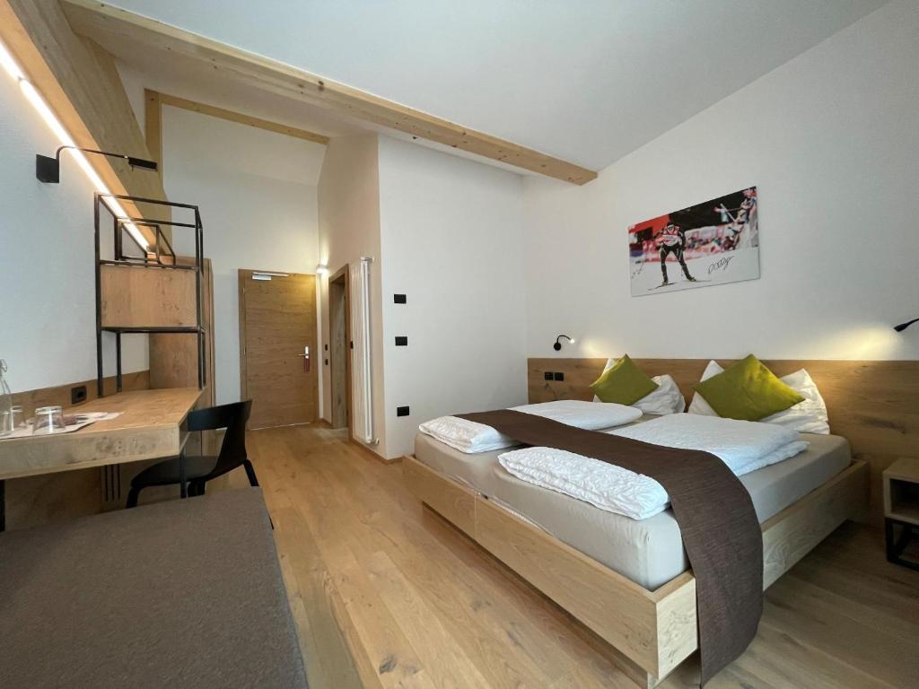 Postel nebo postele na pokoji v ubytování Active Hotel Rosat