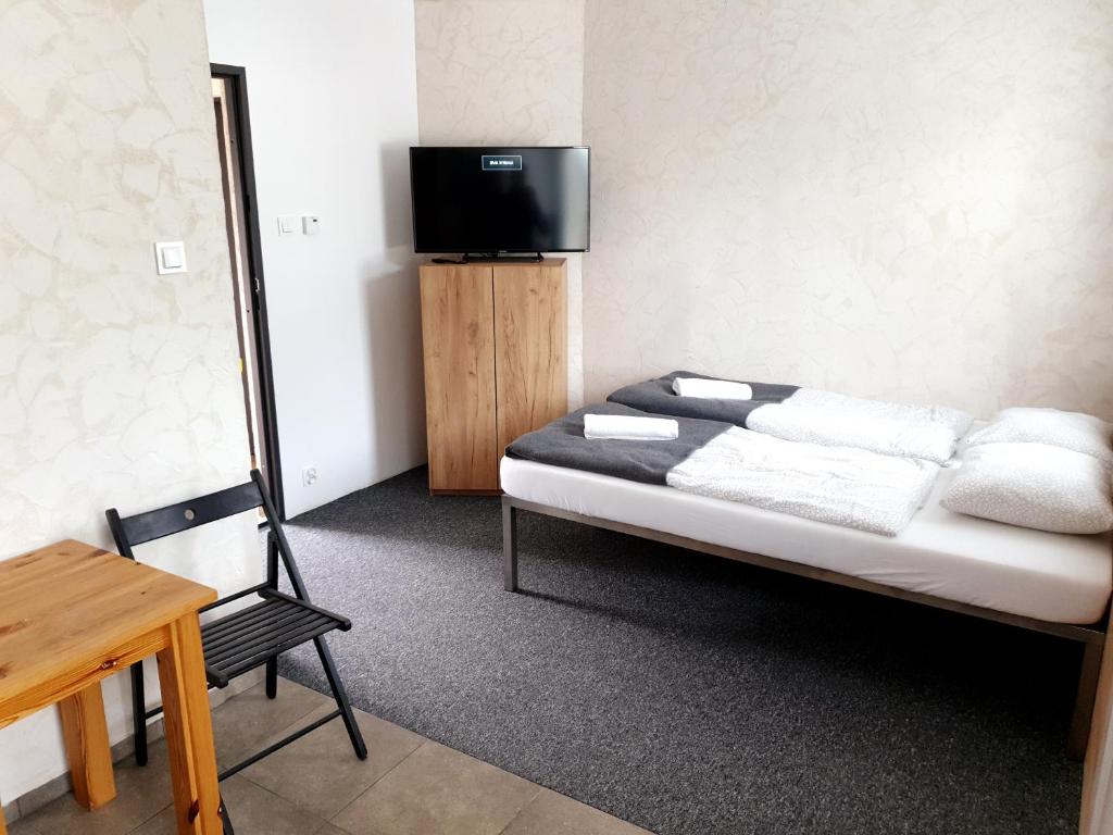 Postel nebo postele na pokoji v ubytování BoomerangHouse