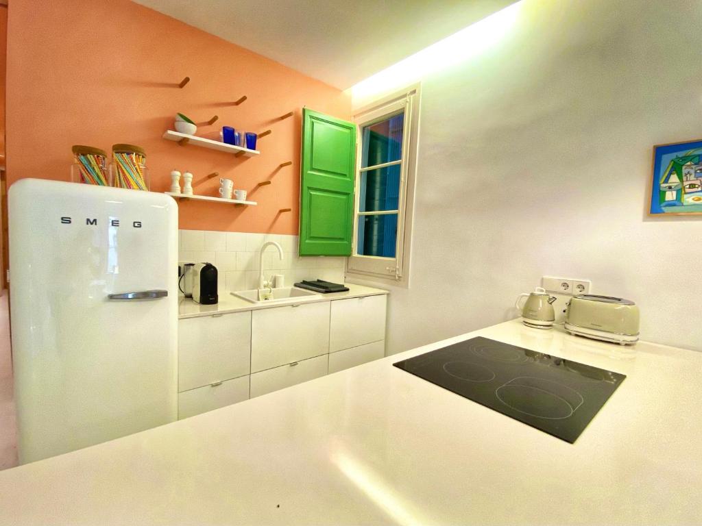 Kuchyňa alebo kuchynka v ubytovaní Tyche apartment