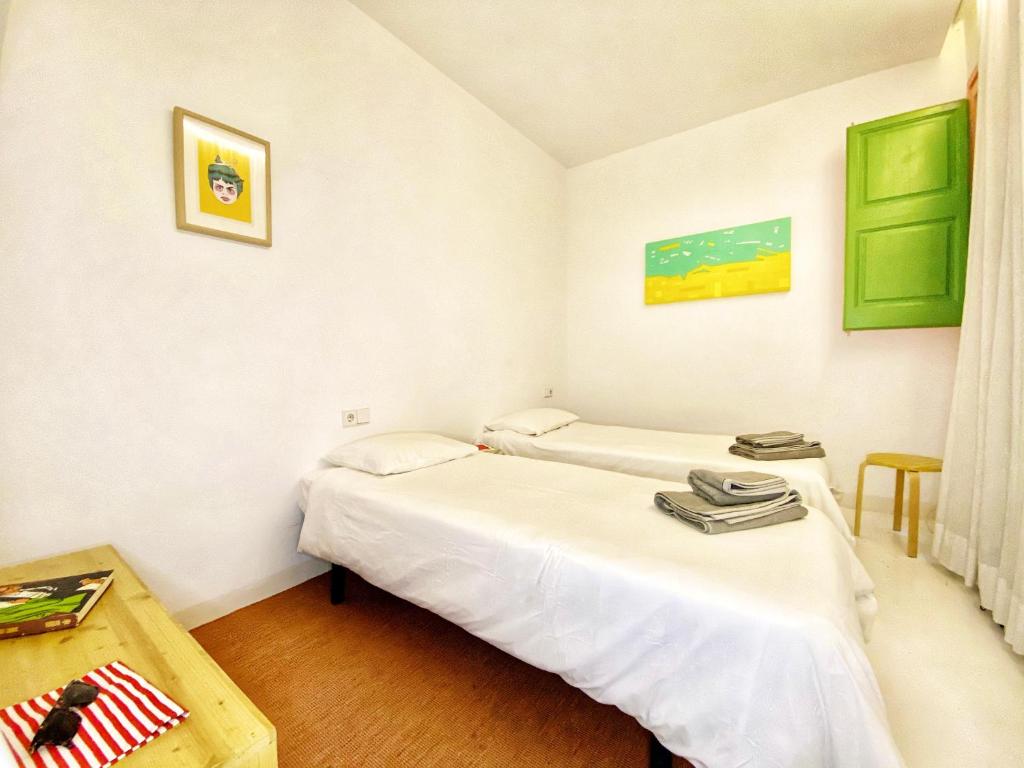 Posteľ alebo postele v izbe v ubytovaní Tyche apartment
