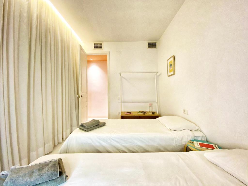 Posteľ alebo postele v izbe v ubytovaní Tyche apartment