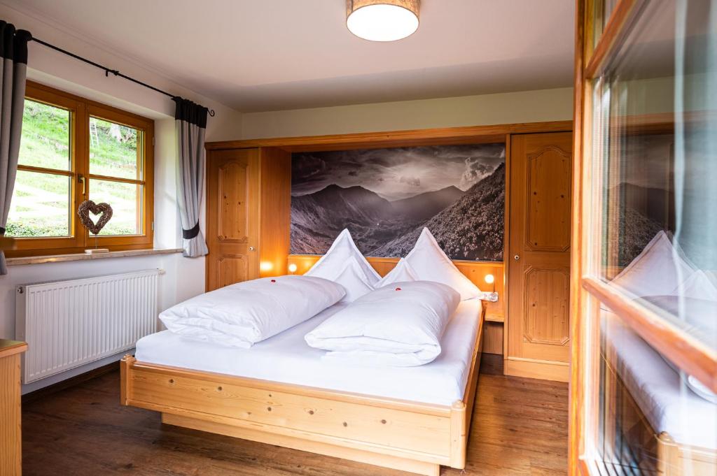 Postel nebo postele na pokoji v ubytování Landhaus Eggensberger