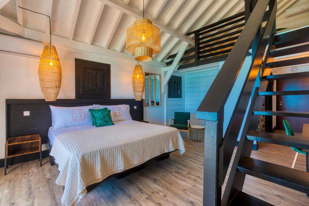 Postel nebo postele na pokoji v ubytování Love Boutique Hotel