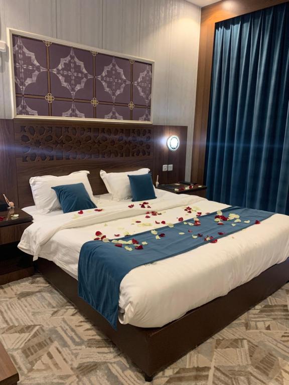 Postel nebo postele na pokoji v ubytování قست العصر للشقق المخدومة guest Aleasr Serviced Aprtments