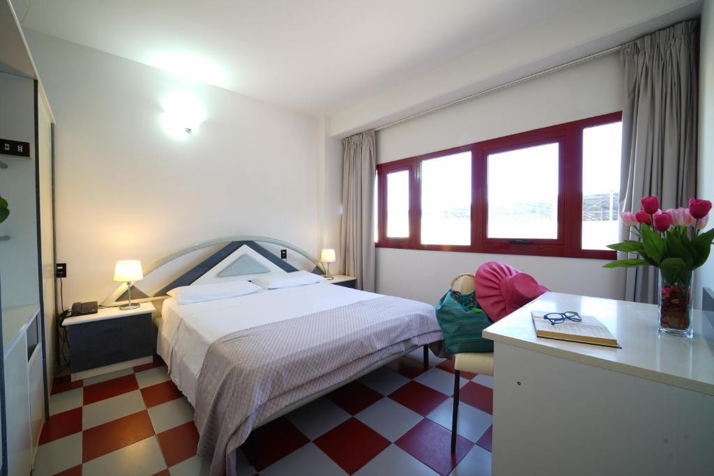 Postel nebo postele na pokoji v ubytování Onda Hotel