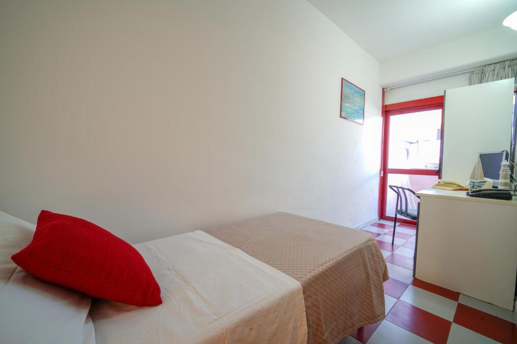 Postel nebo postele na pokoji v ubytování Onda Hotel