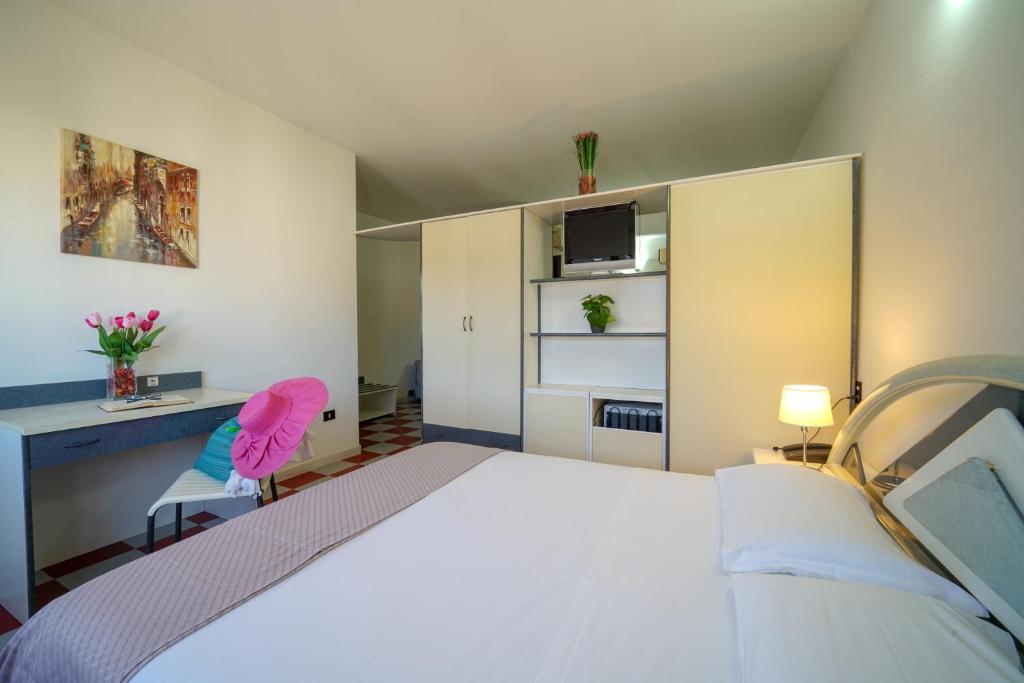 Postel nebo postele na pokoji v ubytování Onda Hotel