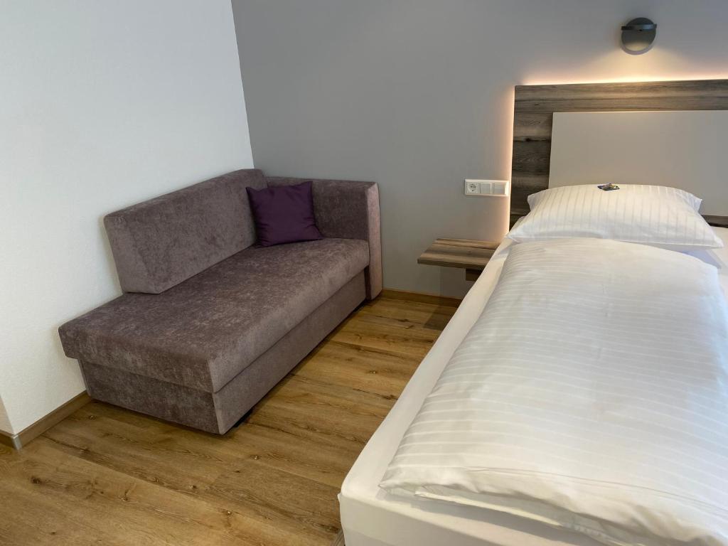 Postel nebo postele na pokoji v ubytování Hotel Kosel garni UG