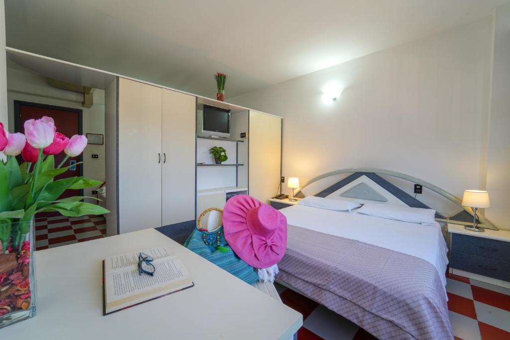 Postel nebo postele na pokoji v ubytování Onda Hotel