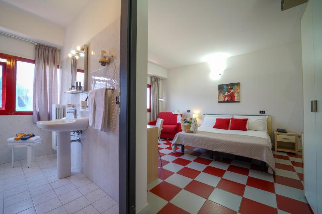 Postel nebo postele na pokoji v ubytování Onda Hotel