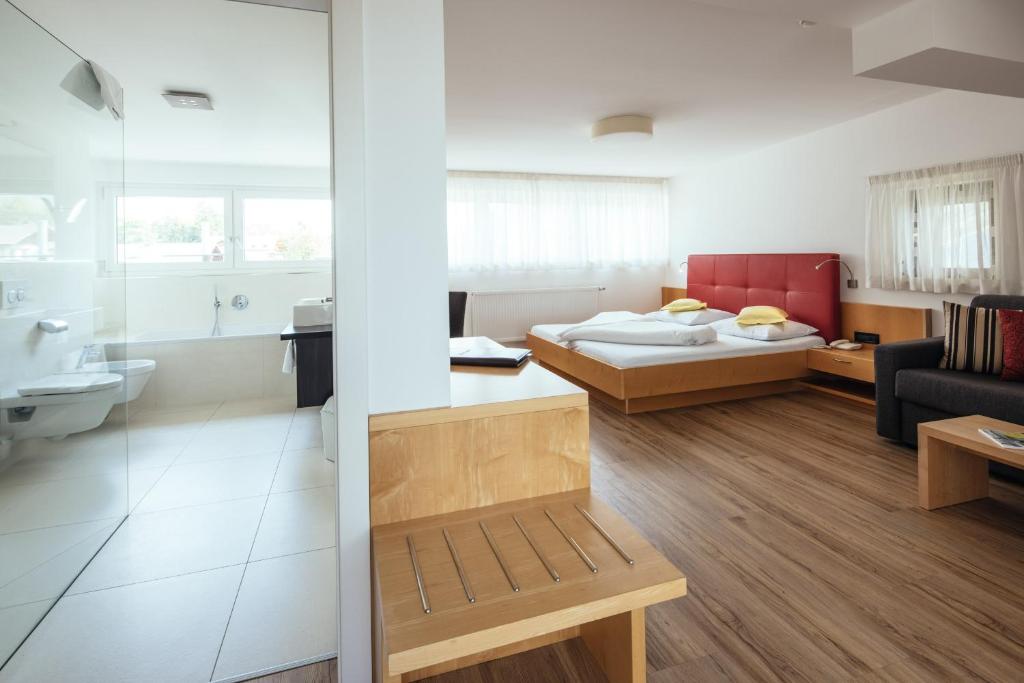 Postel nebo postele na pokoji v ubytování Hotel Rablanderhof